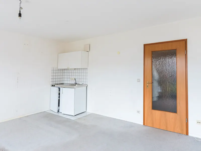 Ruhige 1-Zimmer-Wohnung mit privatem Gartenanteil