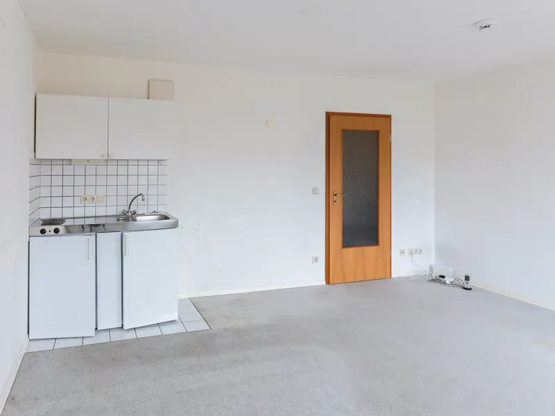 Ruhige 1-Zimmer-Wohnung mit privatem Gartenanteil