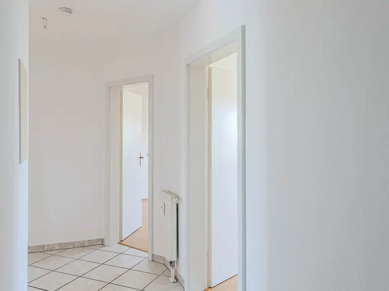 Lichtdurchflutete 3-Zimmer-Wohnung mit ausgebautem Dachboden